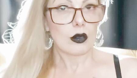 * Close-up * Marlboro reds * Dangling * Nose exhales * Black Lipstick