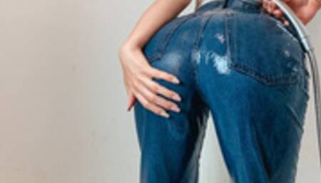 Soaking blue jeans and wet top