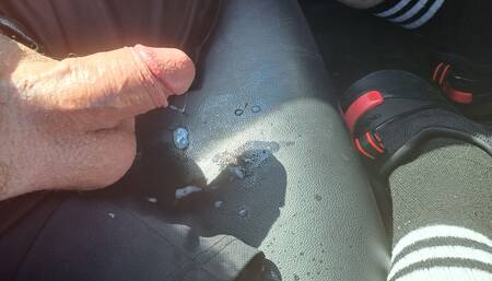Beary Hairy busts a load of cum in an outdoor parking lot