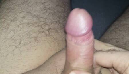 Masturbating my little cock until it cums.