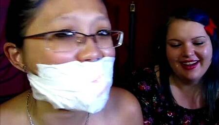 Teaching little mina the art of self-gagging!