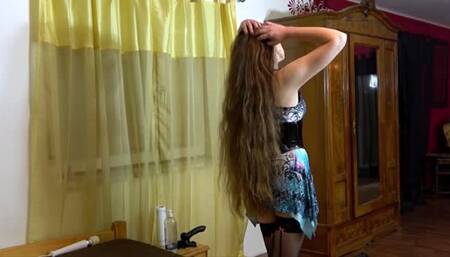 The Dragonlady fucks her Slave with a Strap on while he is locked up in a chastity Cage