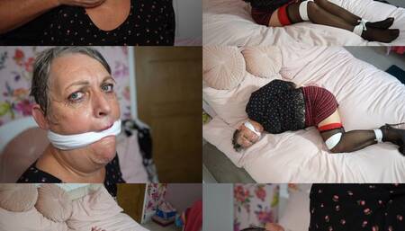 Marika, gilf teacher bound and hanky cleave gagged on the bed (mp4)