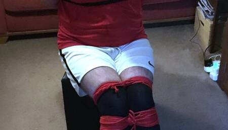 Footballer tightly bound gagged and tormented by femdom