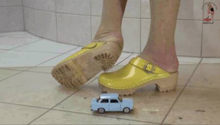 Poor Trabbie under wooden Clogs