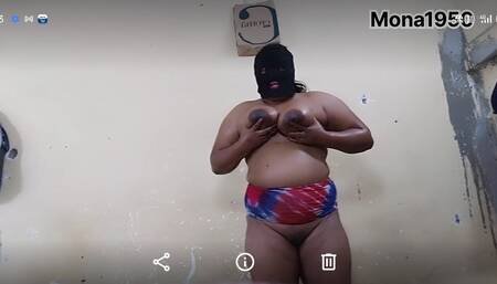 Monabhabhi doing coconut oil massage on her body by herself.