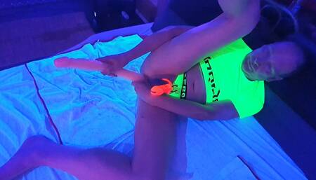 Lisa helps Mike playing with his big boys toys whilst locked in glow in the dark chastity cage