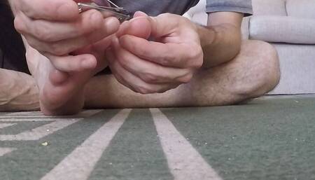 cutting my toe nails for you close up