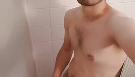 Horny guy rubbing one out in the bathroom, with cumshot