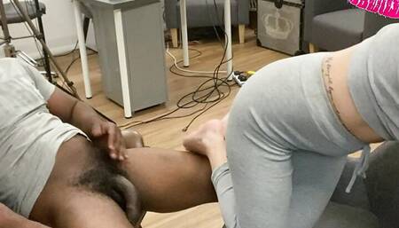 Dirty white MILF gives a black guy a foot fucking