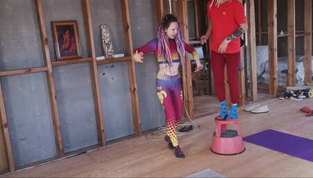 Hippie girl lifts a slim guy