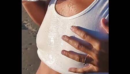 Big ass latina pouring water over her nipples