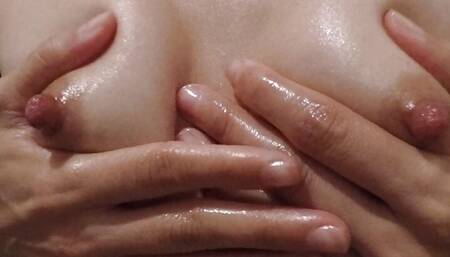 Massage with oil to my tits