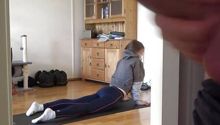 I love to watch how my stepsister is doing yoga and jerk off