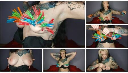 Tattooed, kinky girl hangs the maximum number of clothespins on her big tits