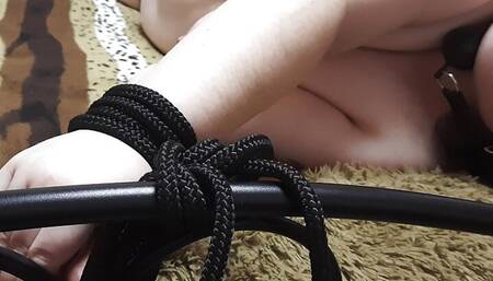 BBW slut with a ballgag in her mouth tied to a bed, flogged and fucked from behind with massive facial in the end
