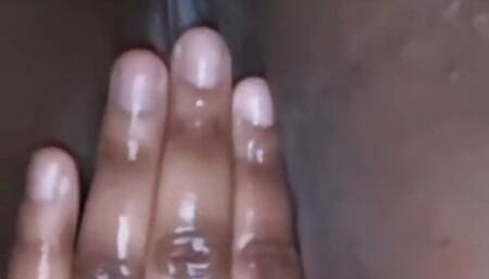 ebony teen playing with creamy pussy