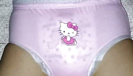 teen wearing pink diaper panties and humping pillow cum in diaper