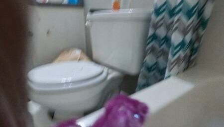 tiny human hitches a ride on giantess MX loofa while she cleans her body
