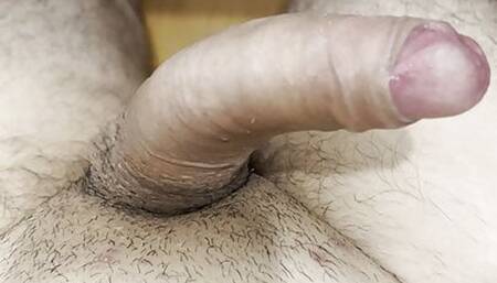 Big uncut cock shoots a huge load of cum while wanking