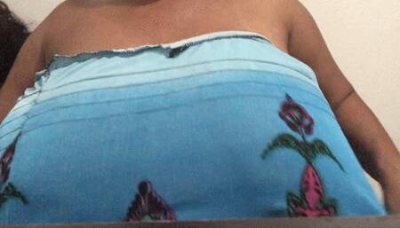 Giantess teasing teeny car with her huge breasts