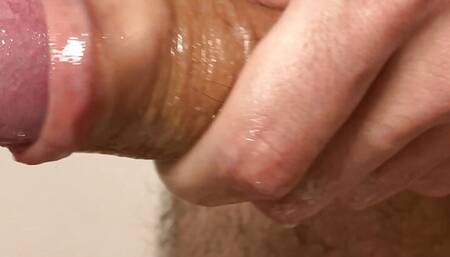 Close-up oiling and jerking off my very hairy big uncut cock