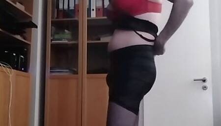 Sissy strips from her outfit