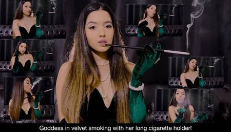 Goddess in velvet smoking with her long cigarette holder!