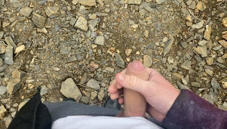 I jerk off a flaccid dick and cum on a mountain lake in nature! POV!