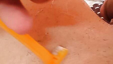 Shaving my balls and my penis.