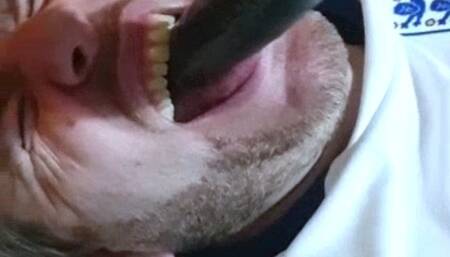 Footballer made to suck used dildo