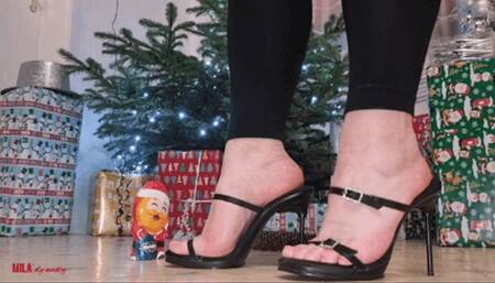 Mila decorates Christmas tree