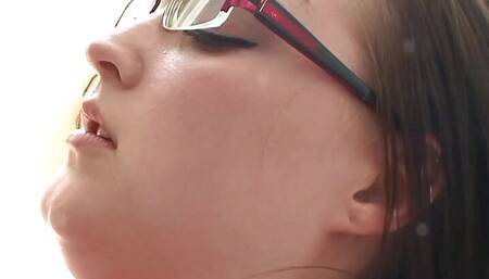 She might look geeky but the brunette with glasses can put