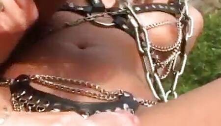 Threesome sex slave enjoys cock outdoors