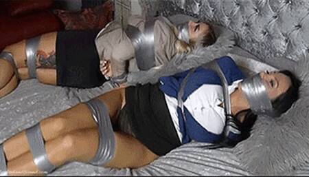 Hannah & Mila in: Toss Those Busty Snoops in That Bedroom for Now & Keep 'em All Wrapped Up While Their Publisher Gets an Ultimatum! (WMV)