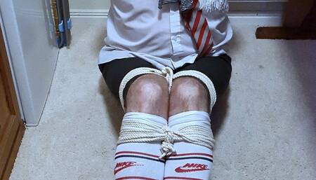 Man kept bound and gagged in adult school uniform 1