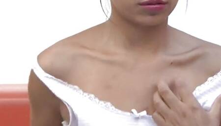 Little Lorie masturbates in close up