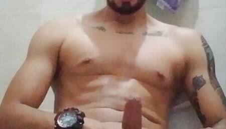 sexy latino touches his hard cock in the bathroom at home