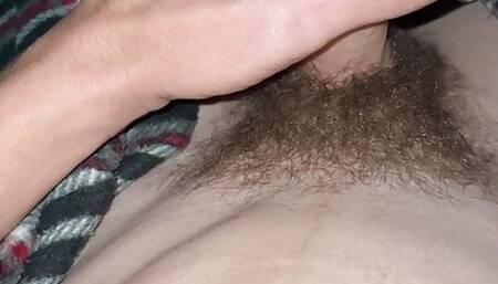 Slowly stroking uncut cock close up