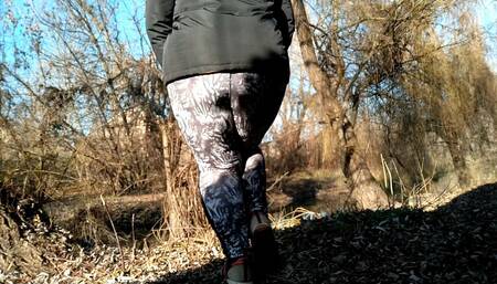 BBW MILF with big butt in leggings pissing outdoors while standing doggystyle