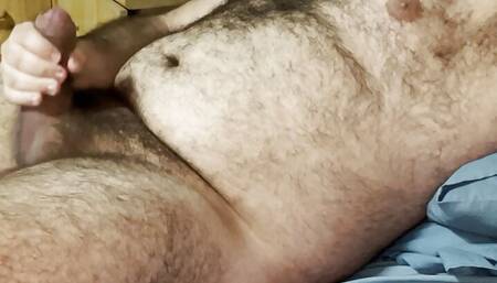 Hairy Uncut Bear Cub shoots cum all over himself