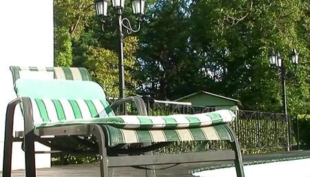 Watching this lush blonde enjoy sensual anal sex by the pool