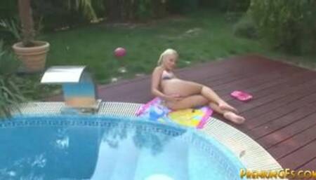 Young Kimmy masturbating by the pool
