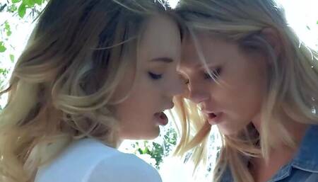 Lesbo blondes strip each other off in the woods before