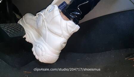 Driving a car on two perspectives in buffalo boots 2