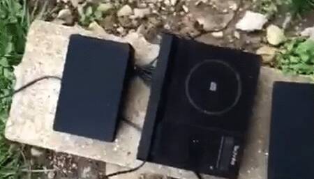 Hifi System crushed under Red sole boots