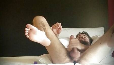 Throbbing hard hot young guy plays with with a butt plug and has an ecstatic orgasm
