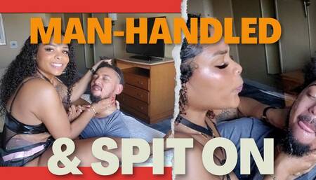 Man-handled and spit on