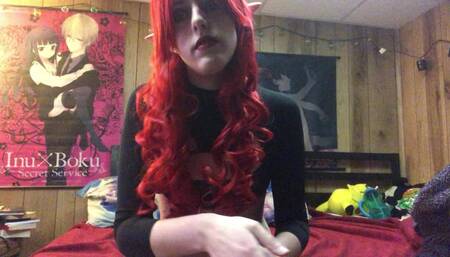 Devil girl teases with her paddle