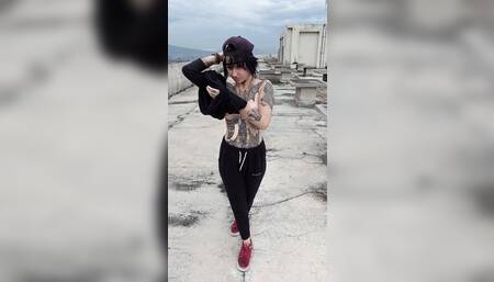 Undressing on the roof